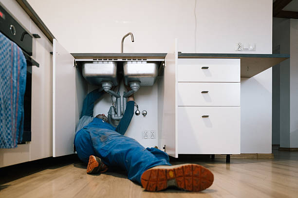 Professional Emergency Plumber technician working in Central City, PA